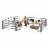 Farmář s křovinořezem a strakatá kráva s telátkem - ZooLandia